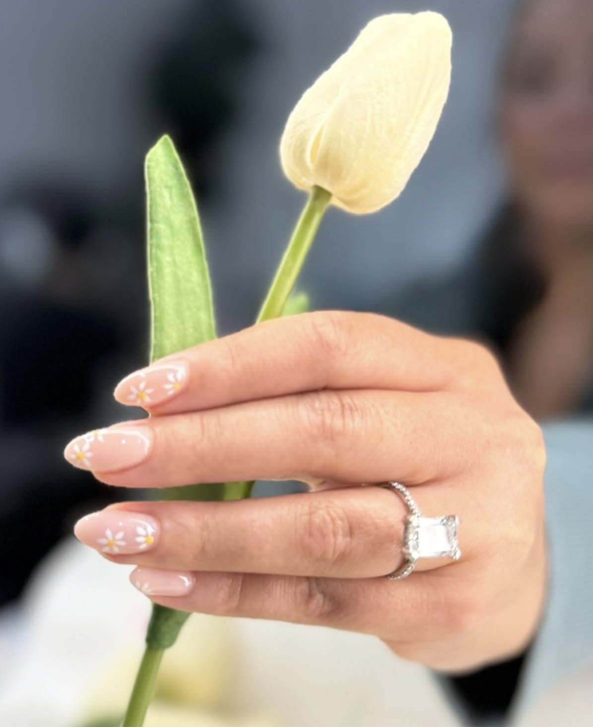 Sheer pink nails with white daisies